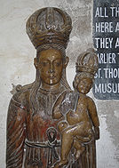 Portugese relic made of petrified wood in Diu Museum.jpg