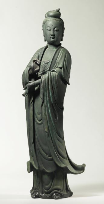 一个铜牌和银牌嵌立像千手观音瓷器，明代.jpg