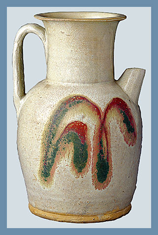 长沙窑白釉红绿彩瓷壶——最早的铜红彩瓷.jpg